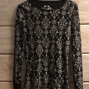 delia’s black and white long-sleeved thermal shirt